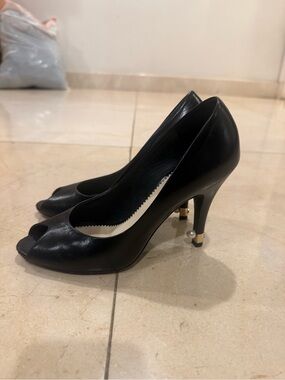 CHANEL Black Peep-Toe High Heels with Gold & Pearl Heel Accent
